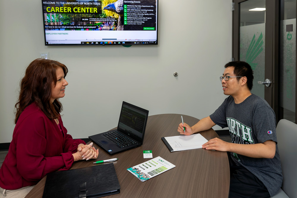 Student meeting with advisor at the career center